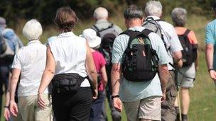 A group of ramblers walking in the countryside