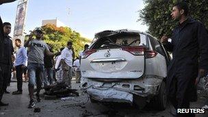 Back of Italian embassy car damaged by a bomb, Tripoli, 11 June 2013