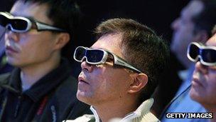 People watching 3D television