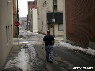 Man walking back streets in Hazleton