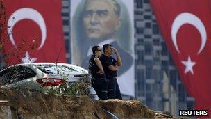 Turkish police guard the entrance of Gezi Park at Taksim Square in Istanbul June 17, 2013