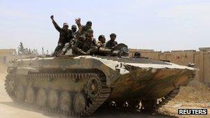 Syrian government soldiers near the town of Qusair. Photo: 7 June 2013