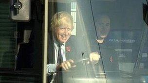 Boris Johnson behind the wheel of one of the new buses in Ballymena