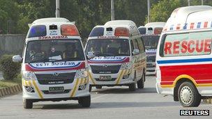 Ambulances carry the bodies of the foreign tourists (23 June 2013)