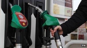A motorist filling up with petrol