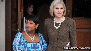 Home Secretary Theresa May (right) with Doreen Lawrence at a memorial service to mark 20 years since the death of Stephen Lawrence