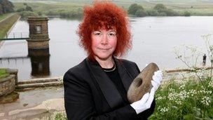 Joann Fletcher with the Neolithic axe