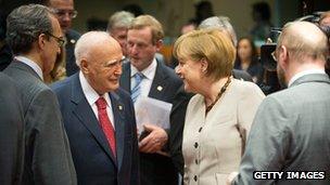 Chancellor Angela Merkel and Greek President Karolos Papoulias