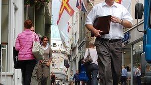 People walking in the High Street in St Peter Port