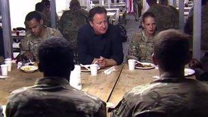 David Cameron eating with troops in Camp Bastion