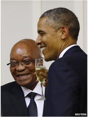 U.S. President Barack Obama (R) attends an official dinner with South African President Jacob Zuma (L) at the presidential guest house in Pretoria, June 29, 2013