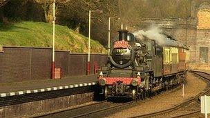 A steam train running on the railway