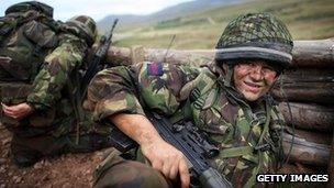 Territorial Army soldiers take part in a live firing exercise