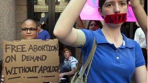 Pro-abortion rights supporter Yatzel Sabat, left, and anti-abortion protestor Amanda Reed demonstrate at the state Capitol in Austin, Texas, 2 July 2013