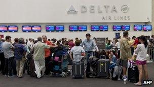 Passengers wait for their flights at Mexico City airport