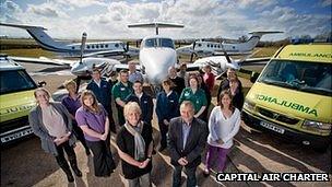 Capital Air Charter staff and vehicles