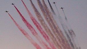 Army jets create an Egyptian flag in the sky