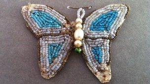 Butterfly belt buckle made by Cpl W. Stinson