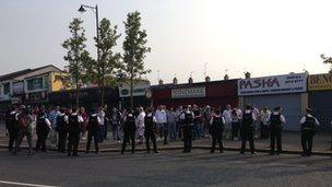 Nationalist protesters have gathered at Ardoyne, amid a heavy police presence