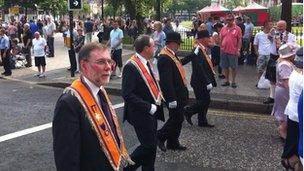 The DUP's Nelson McCausland and Nigel Dodds marched in Belfast City Centre