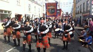 The Whitewater pipe band lead the Armagh parade through Newtownhamilton