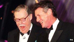 Alan Whicker with Michael Palin in 1998