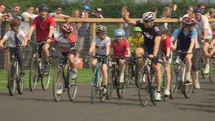 Sir Chris Hoy cycles around the Odd Down track