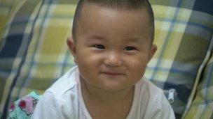 Liang Jinfang's son, nicknamed Huhu