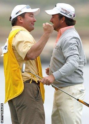 Ken Comboy and Graeme McDowell celebrate after the US Open success