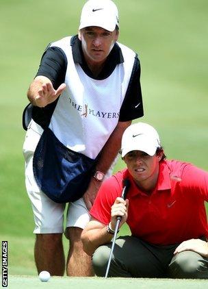 Rory McIlroy with caddie