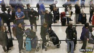 Passengers queuing at Heathrow