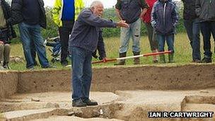 Sir Barry Cunliffe explaining the site