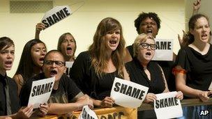 Opponents of the abortion bill protest at the signing in Austin, Texas 18 July 2013