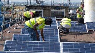 solar panels being installed