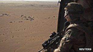 A French soldier on patrol near Tessalit in northern Mali (file pic 2013)