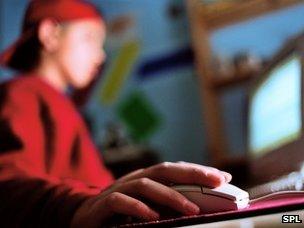 Teenage boy using the net