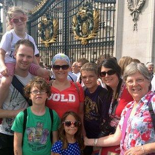 Adam and Robyn Holtham (left), with their family.