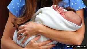 The Duchess of Cambridge holds her baby son