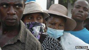 Haitians outside hospital in Saint Marc, October 2010