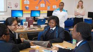 David Stanley shows the Saturday school his Paralympic torch