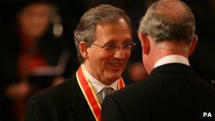 Sir Jon Cunliffe being knighted