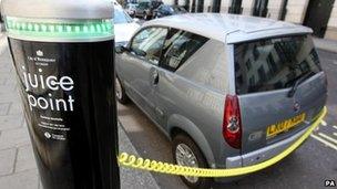 An electric car at a charging point in Westminster