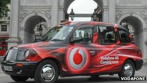 taxi with vodafone logo