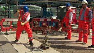 Boris Johnson laying the final paving stones