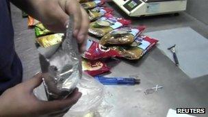 police searching food packets