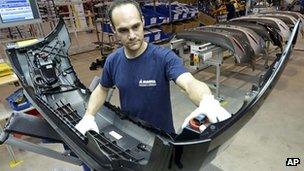 Worker at Germany's Magna car parts firm, 24 Apr 13