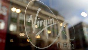 Virgin Media logo on a window