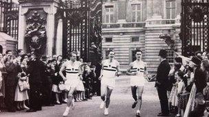 L-R Chris Brasher, Roger Bannister (with baton) and Chris Chataway at Buckingham Palace.