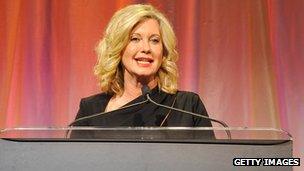 Presenter Olivia Newton-John speaks onstage during the 2013 G'Day USA Los Angeles Black Tie Gala at JW Marriott Los Angeles 12 January 2013