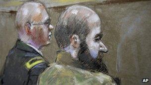 In this court room sketch of court proceedings in the court martial of US Army Major Nidal Malik Hasan, right in Fort Hood, Texas 21 August 2013